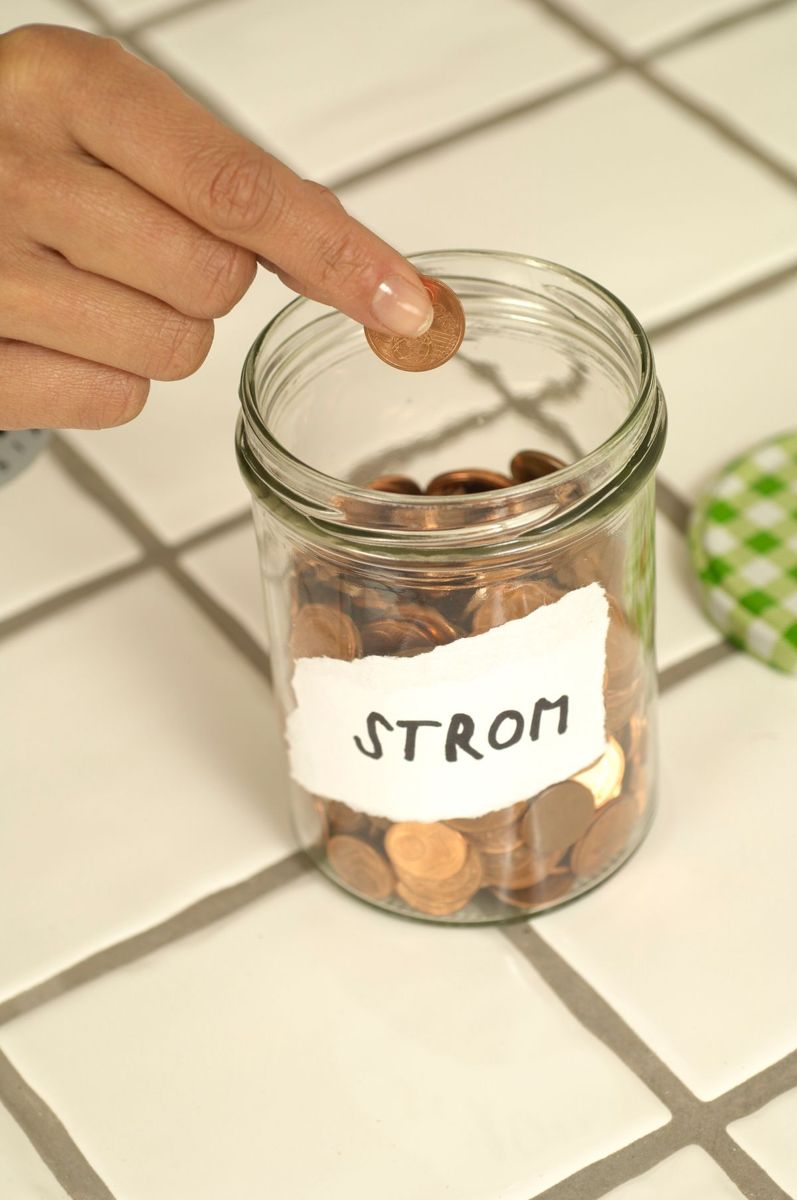 savings jar with coins for sinking fund
