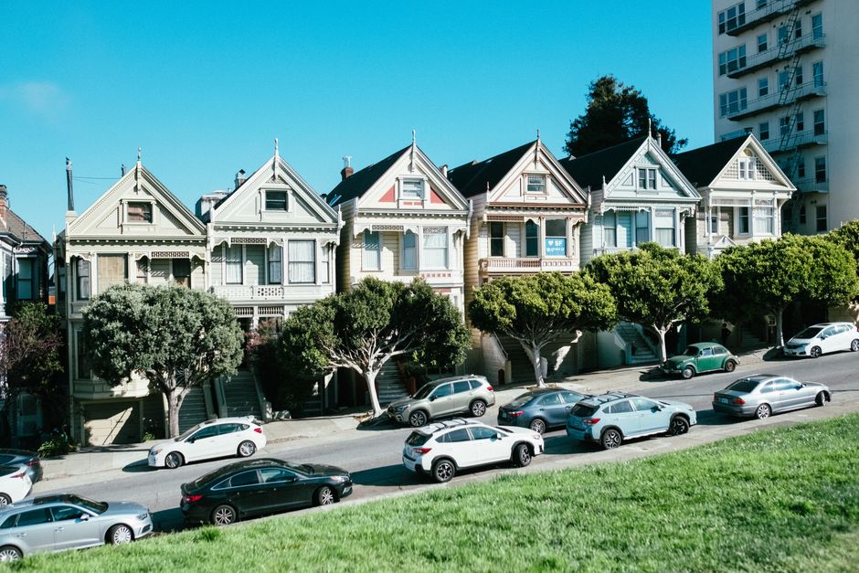 Classic Victorian homes known as the Painted Ladies on a sunny day in San Francisco.